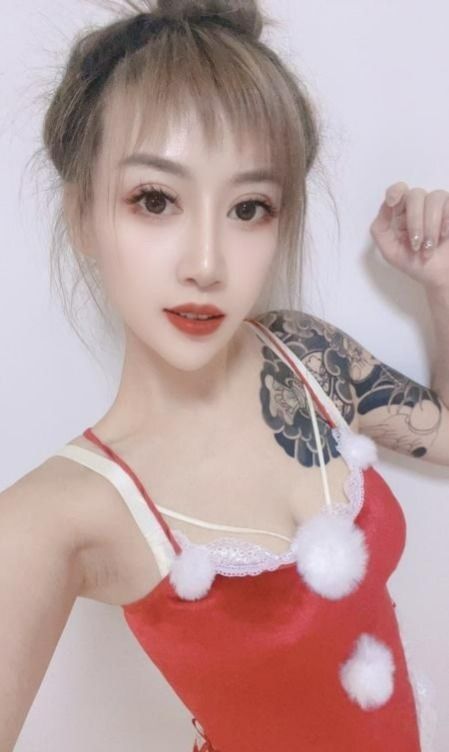 图片[2]-花臂少女-91茶馆